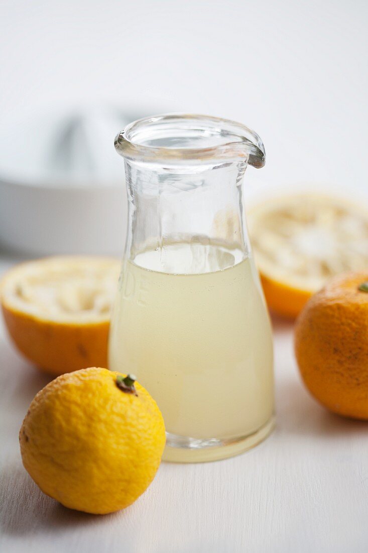 Freshly pressed yuzu juice in a glass carafe