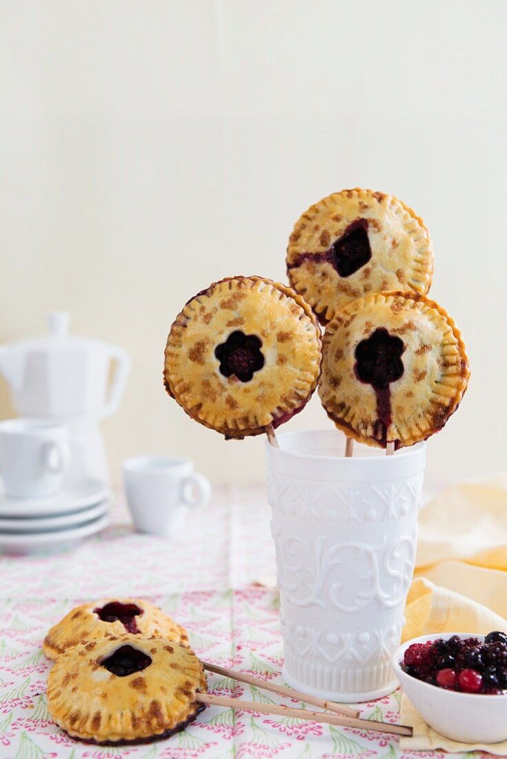 Pies on sticks with blueberry jam