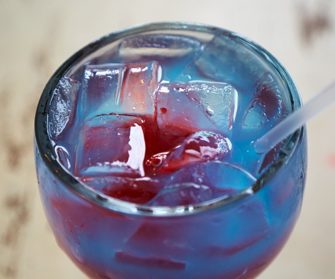Shark Bite (cocktail made with rum, Curacao and grenadine)