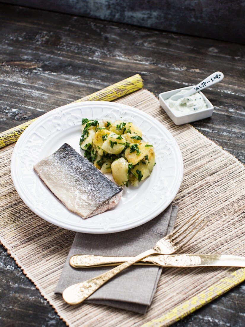 Poached salmon with herb potatoes and a ricotta dip
