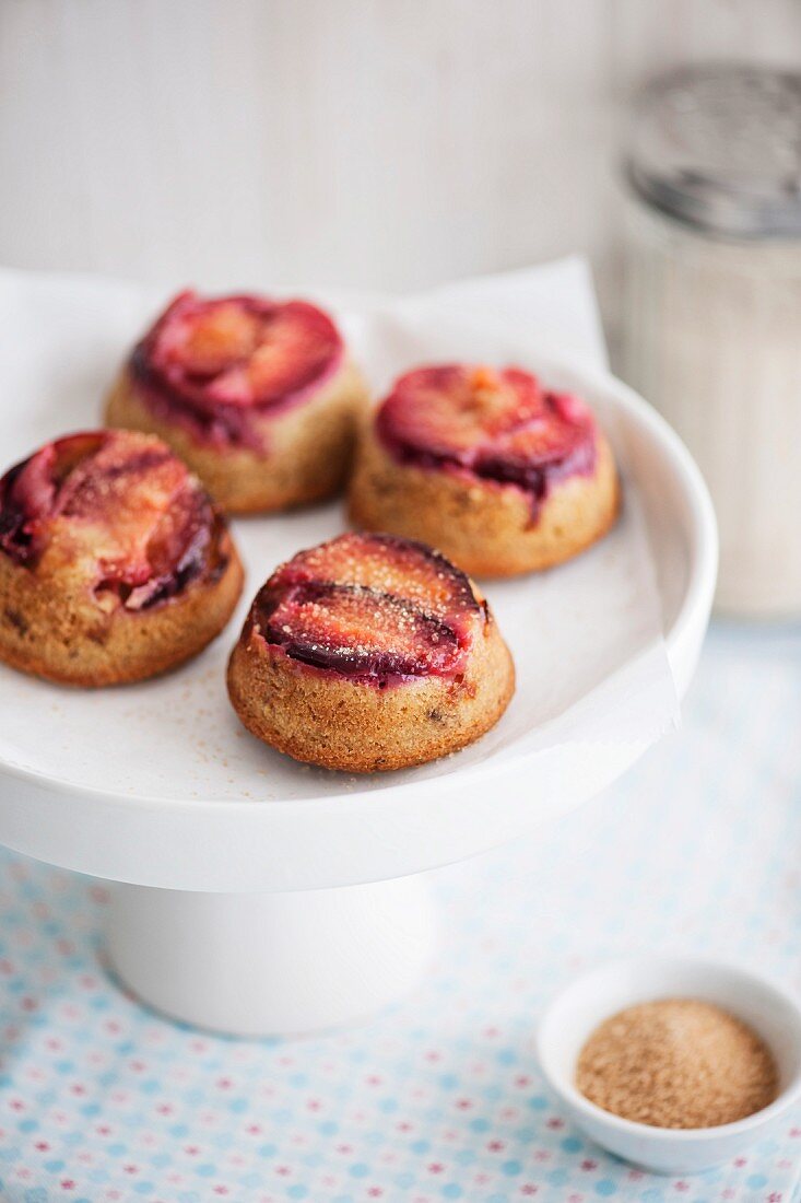 Buttermilk muffins with cinnamon, cardamon, roasted almonds and plums