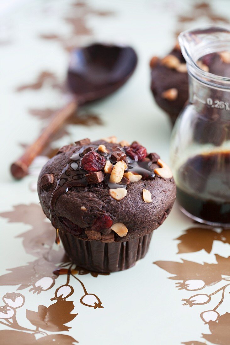Chocolate muffins with sugar beet syrup, nuts and cranberries