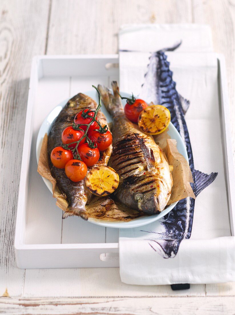 Grilled bass with cherry tomatoes