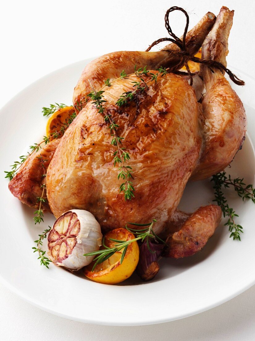 Oven-roasted chicken with lemon, garlic and herbs