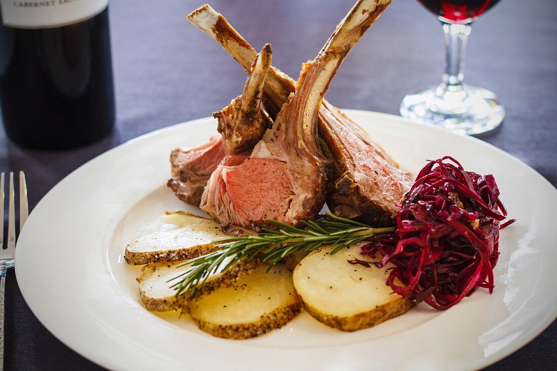 Lamb chops with rosemary, potatoes and red cabbage
