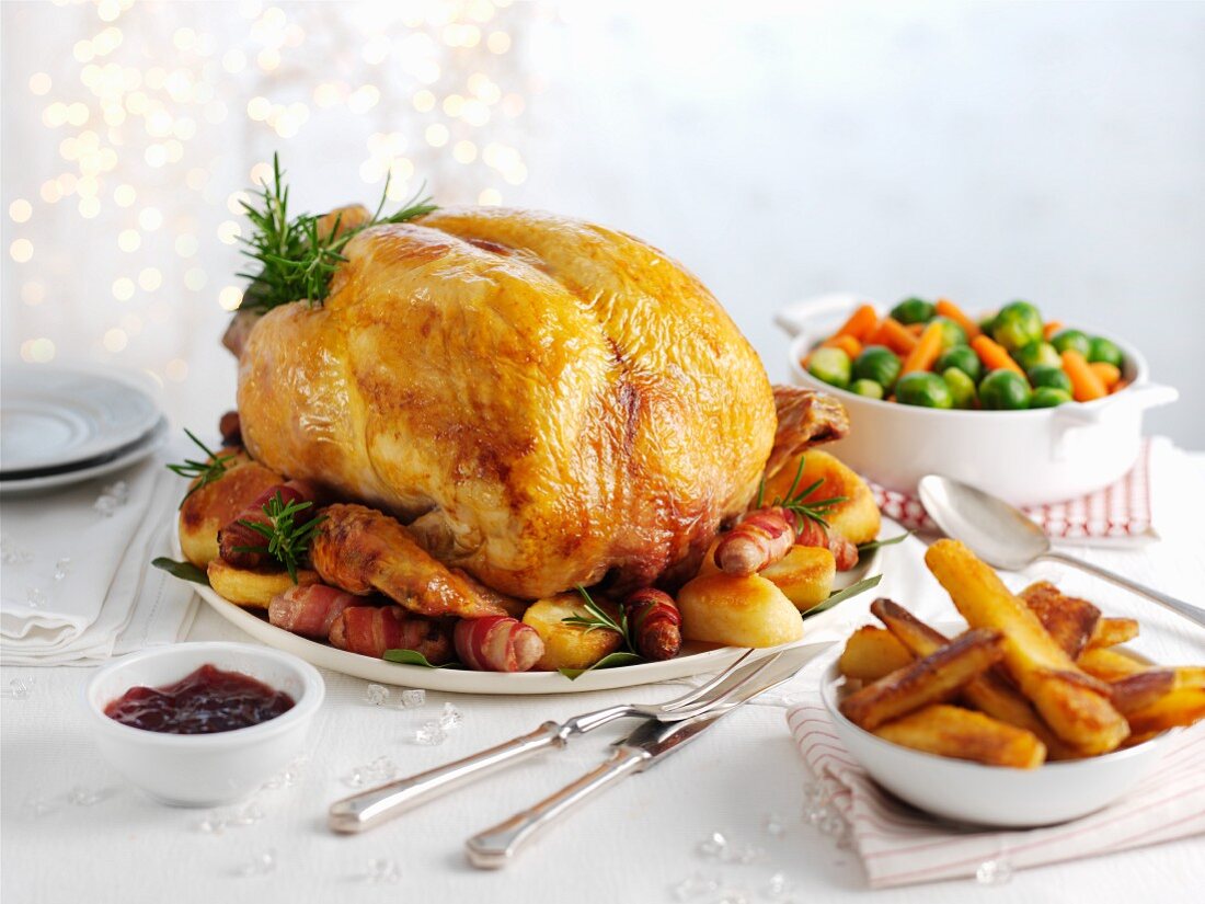 Traditional roast turkey with roast potatoes, carrots and sprouts (Christmas)