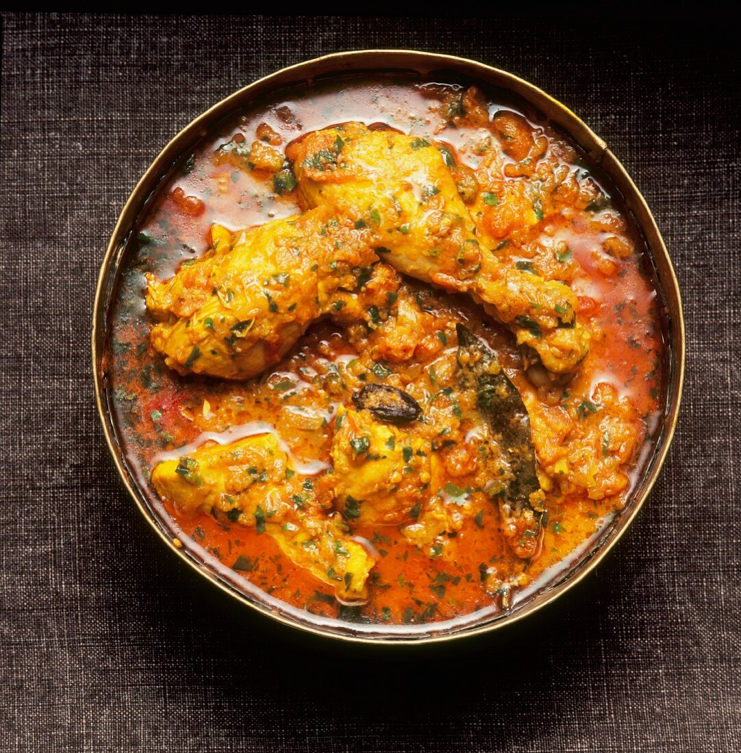 Chicken curry with herbs (seen from above)