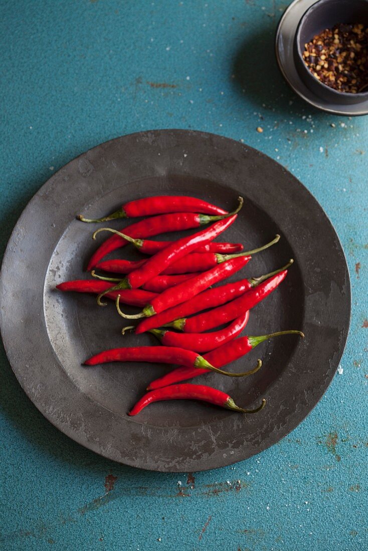 Fresh red chilli peppers on a plate