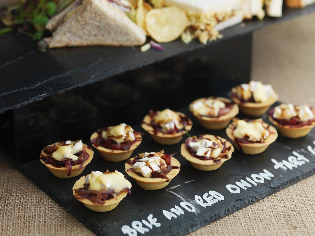 Brie and red onion tartlets