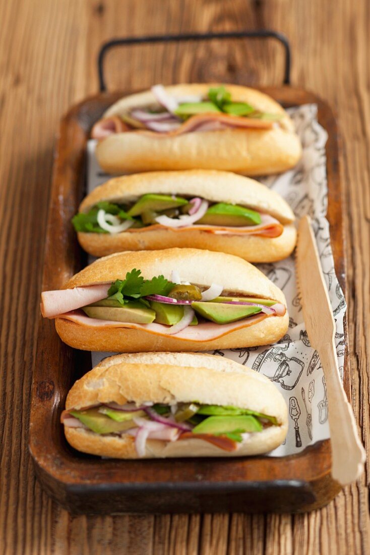 Ham, avocado and red onion rolls