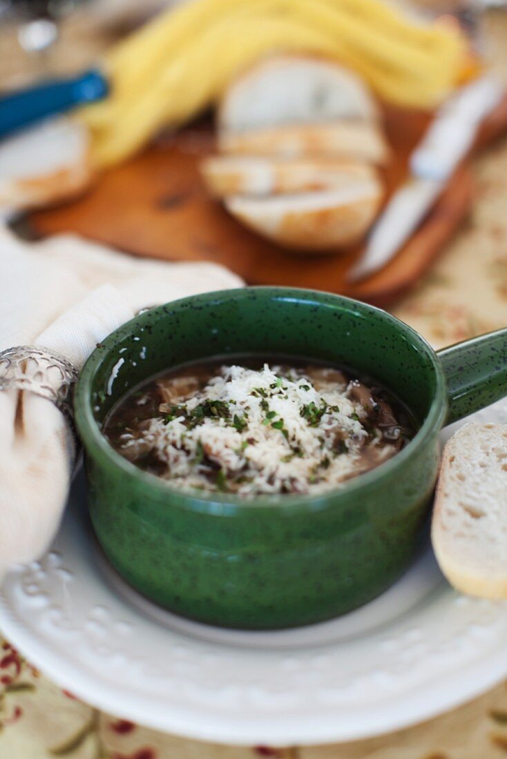 Mushroom soup with melted cheese
