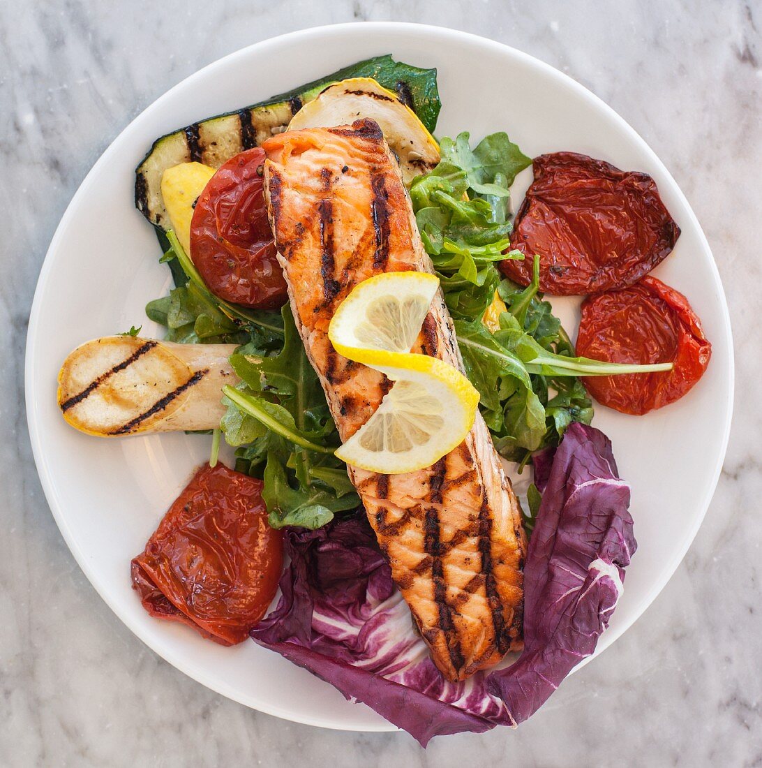 Grilled salmon fillet on grilled vegetables