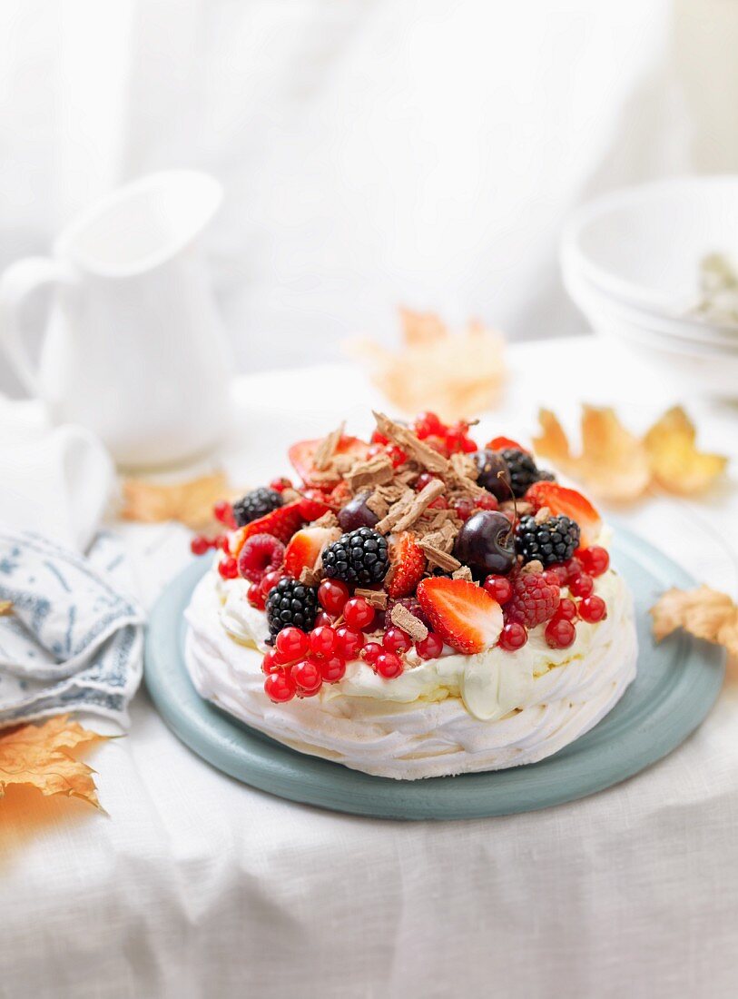 Pavlova with berries and grated chocolate