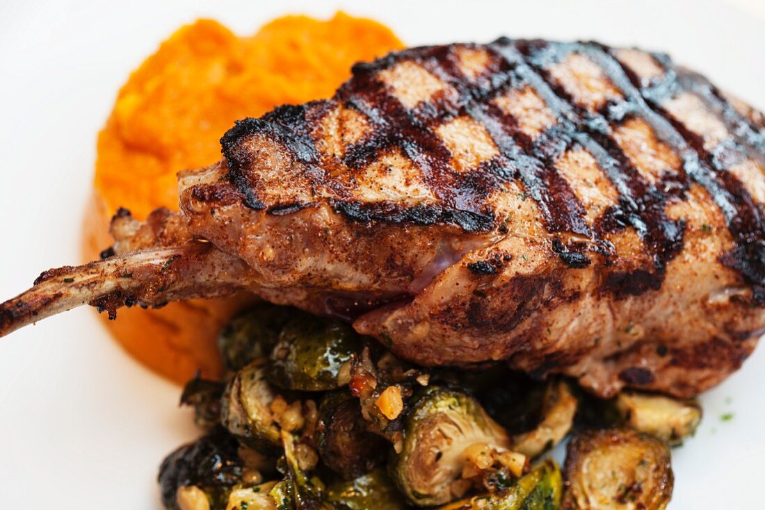 A grilled steak with a side of vegetables