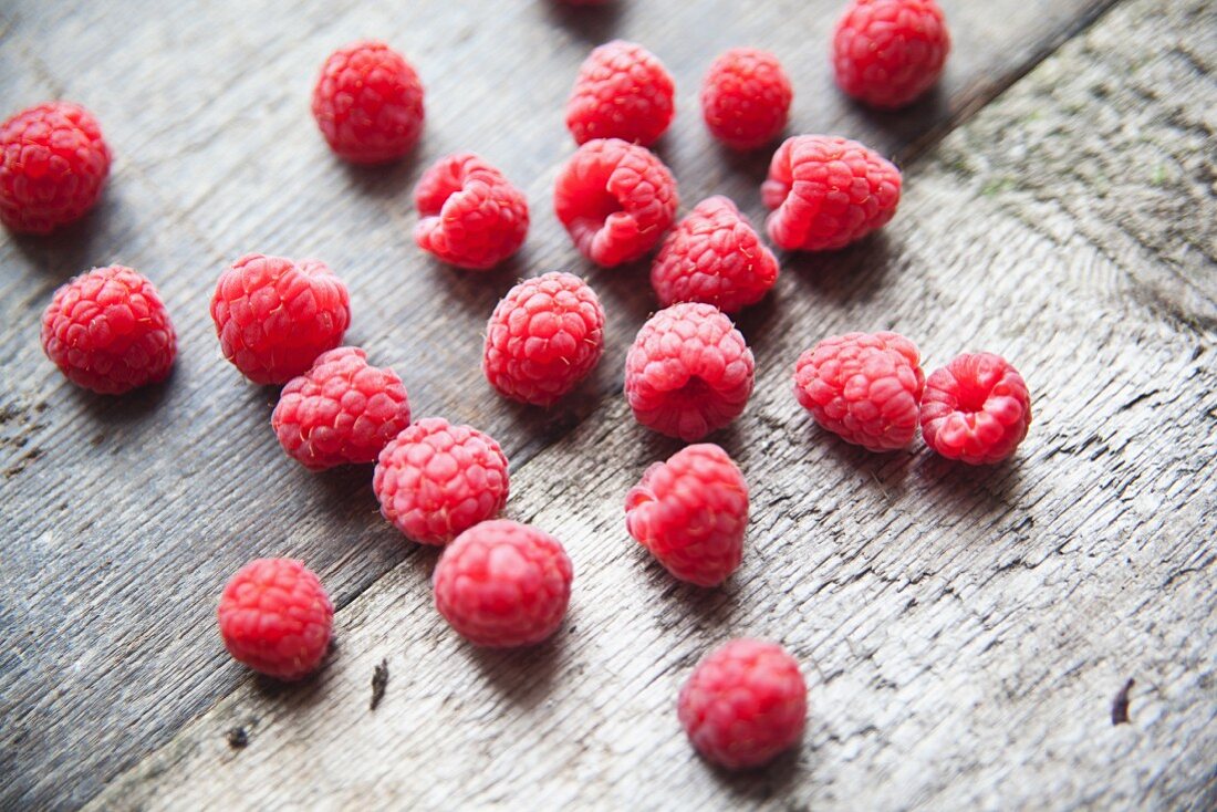 Fresh raspberries on a wooden table