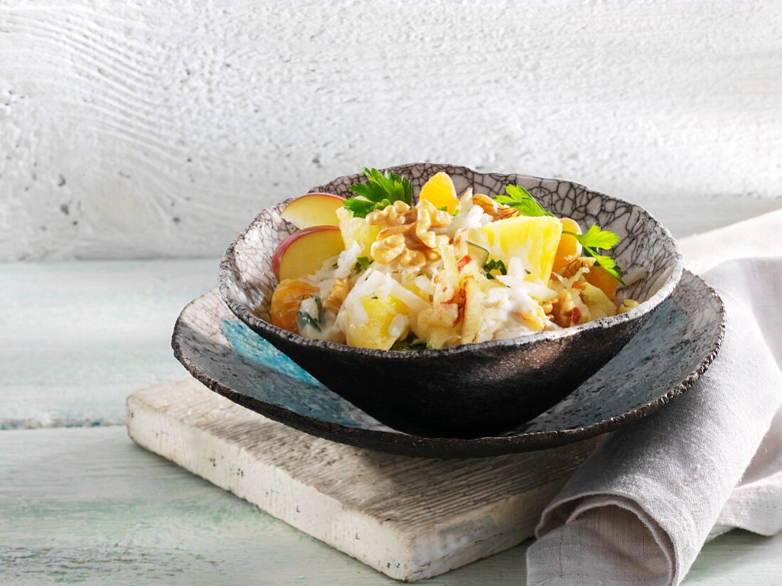 Fruity celery salad with pineapple, apple and walnuts