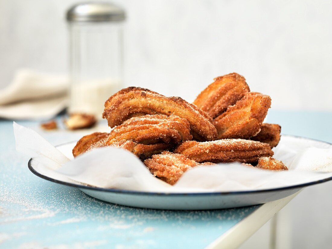 Churros dusted with icing sugar