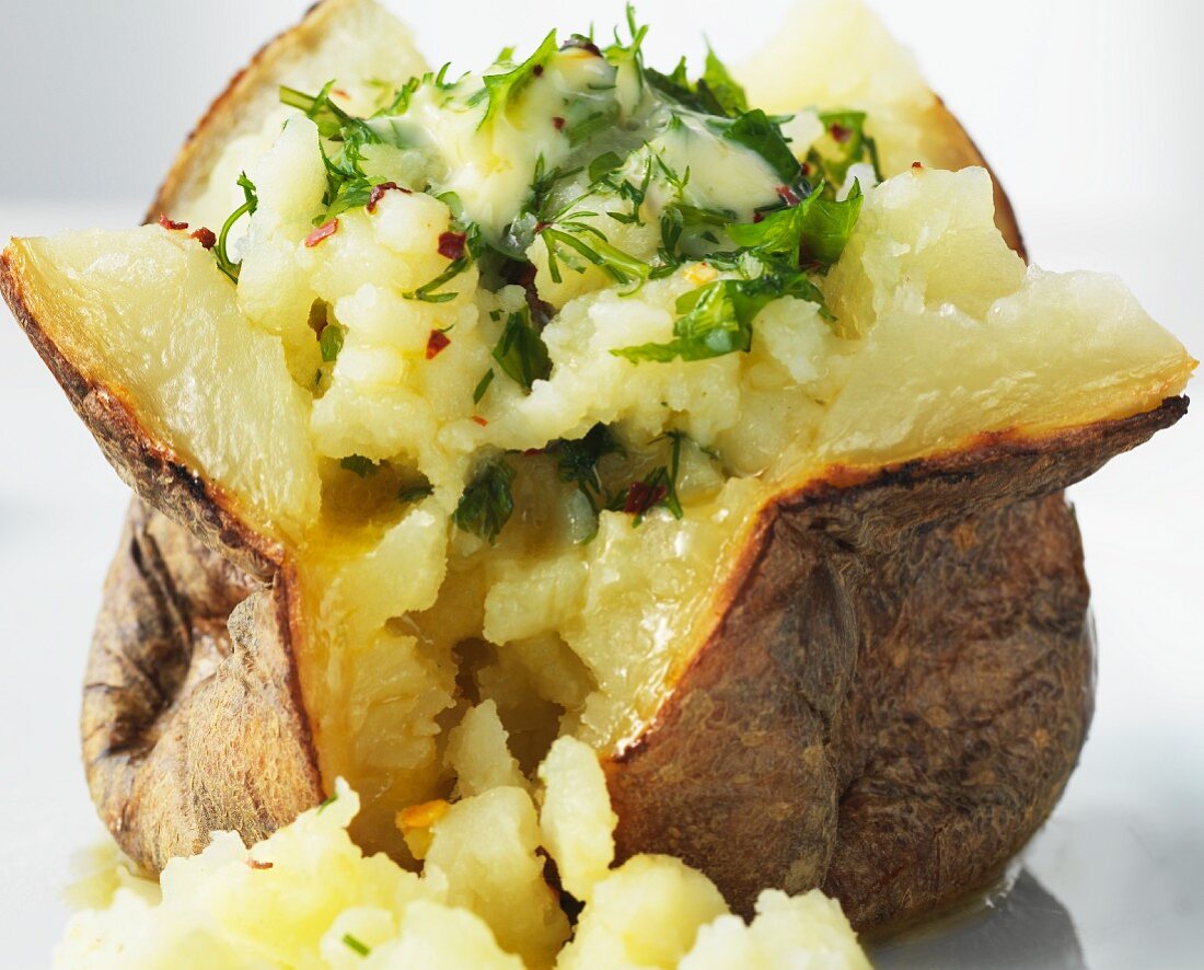 Baked potato with herb butter