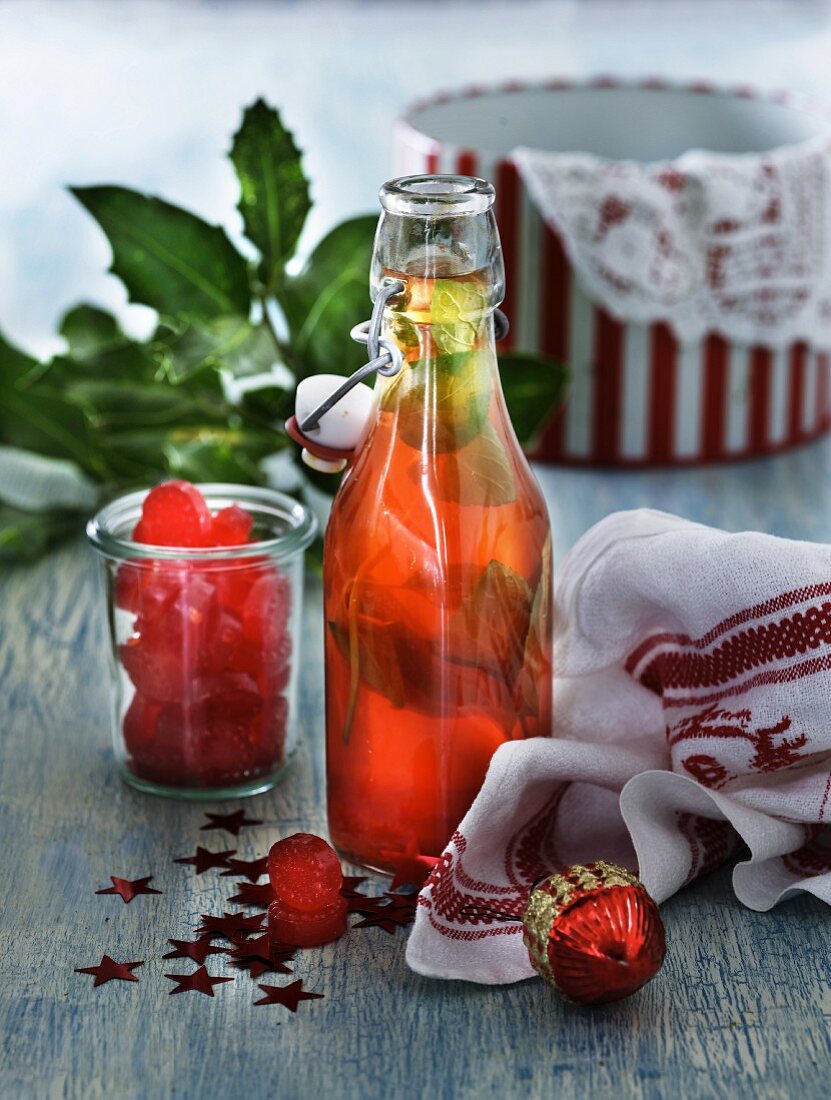 Homemade peppermint schnapps with red sweets