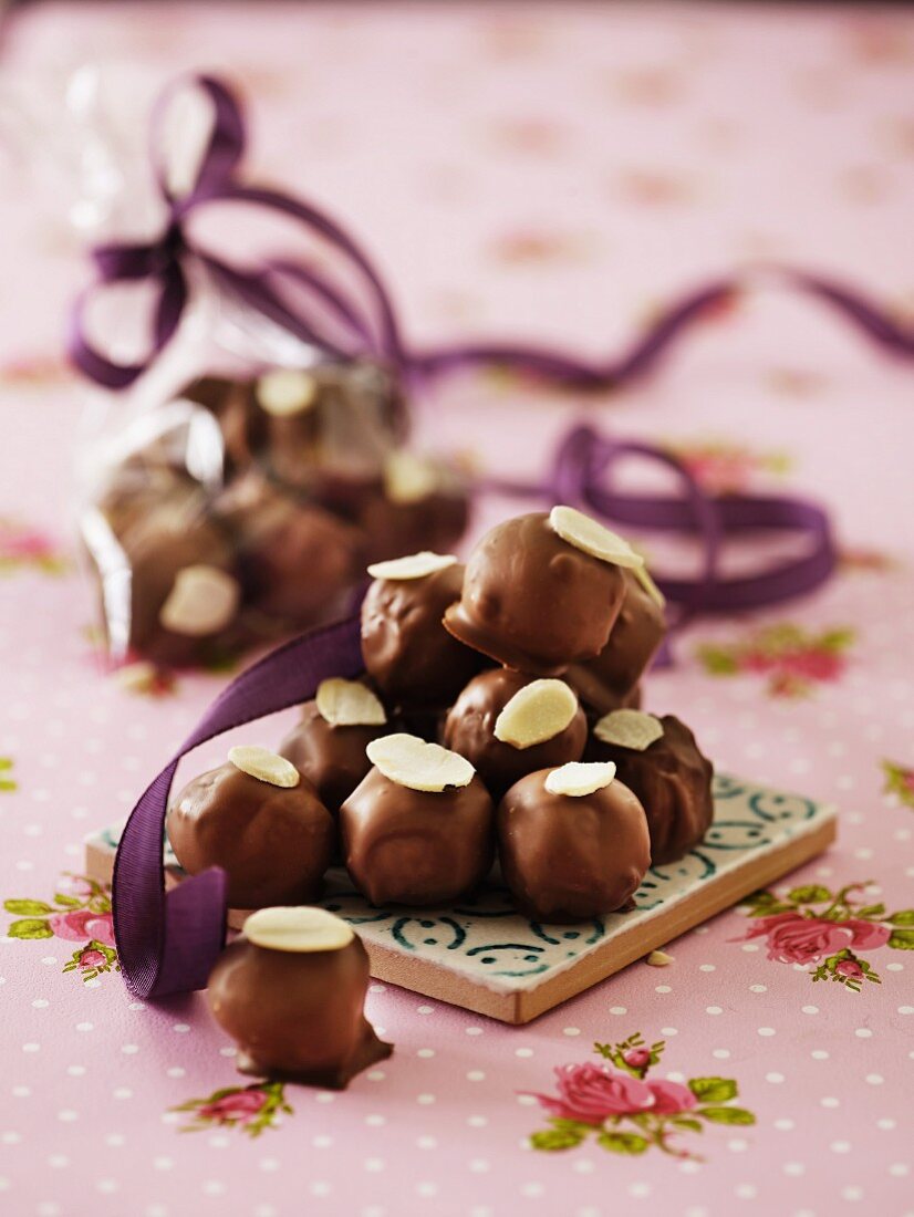 Marzipan pralines with chocolate glaze and flaked almonds