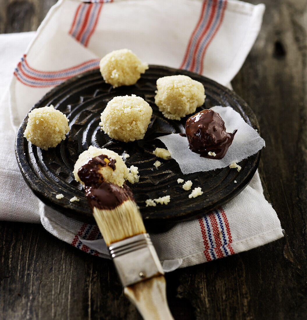 Marzipan balls with chocolate