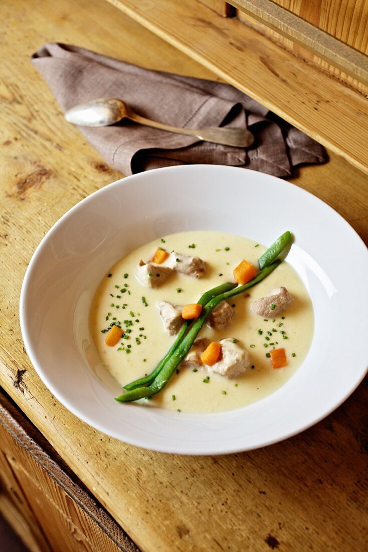 Clear soup with milk-fed veal and vegetables (Austria)