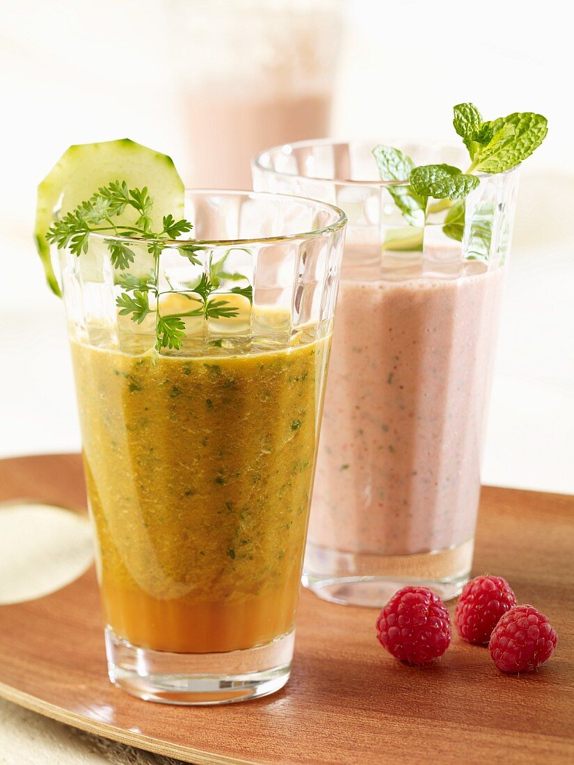 A power drink made with cucumber and chervil and a raspberry and papaya shake