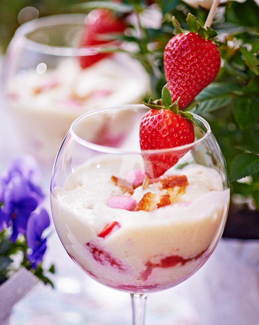 Creamy desserts with fresh strawberries
