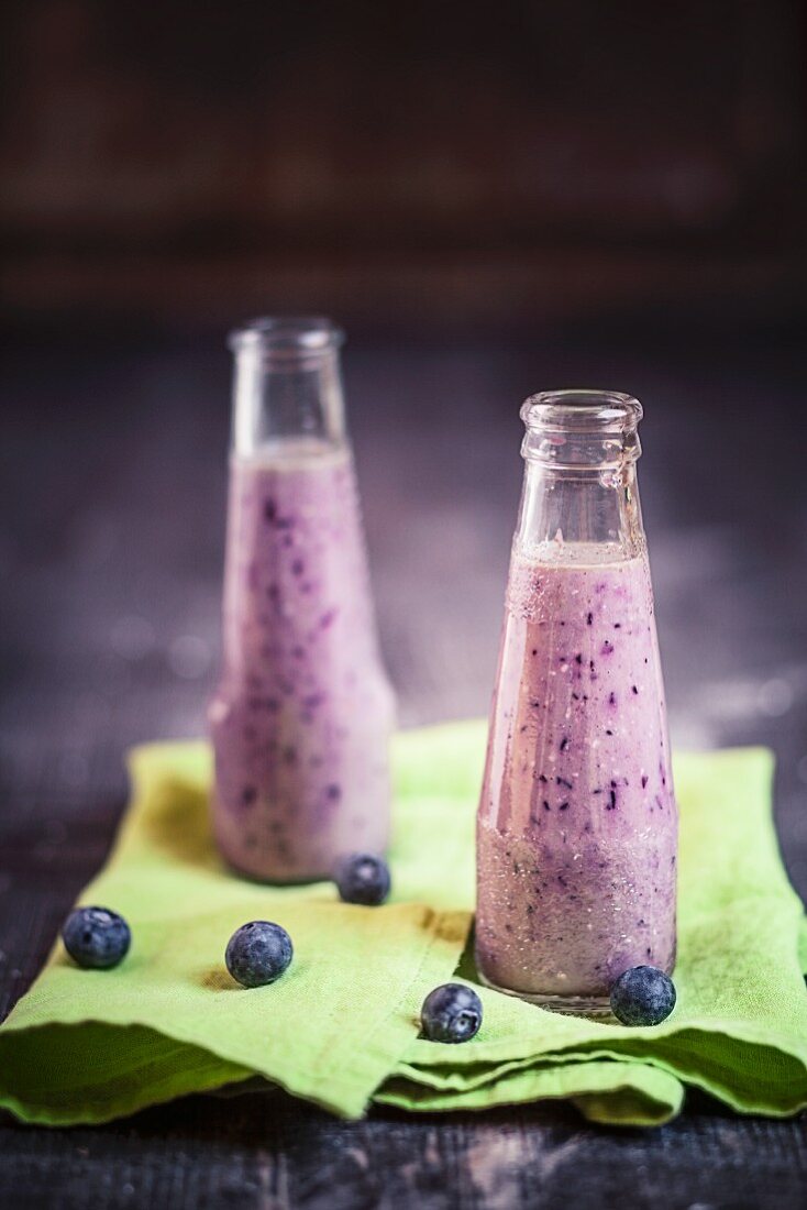 Blueberry smoothies in bottles