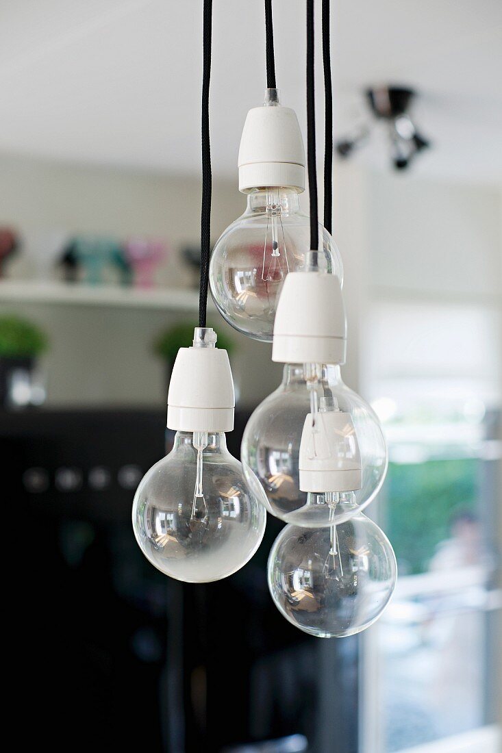 Pendant lamps ending in simple light bulbs