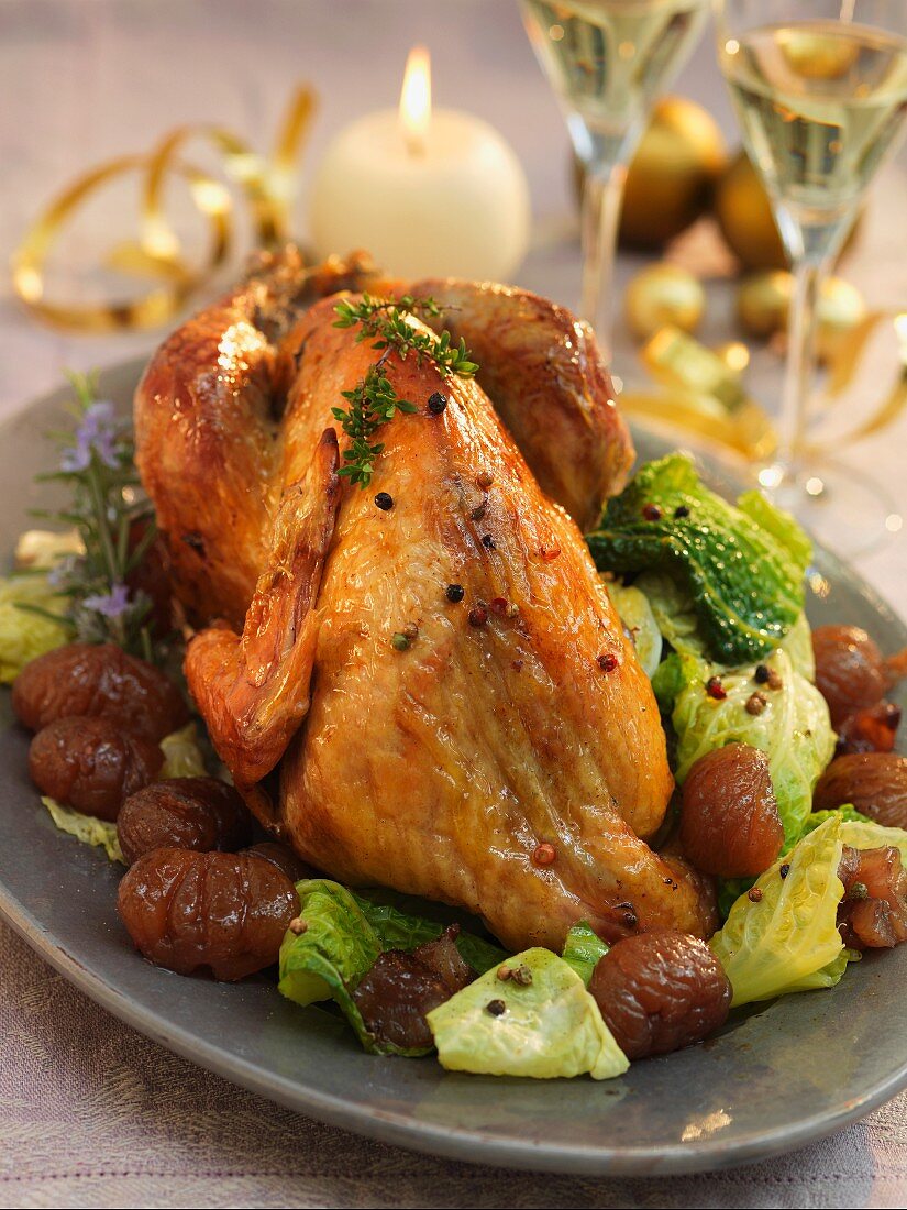 Roast guinea fowl with savoy cabbage and chestnuts for Christmas dinner