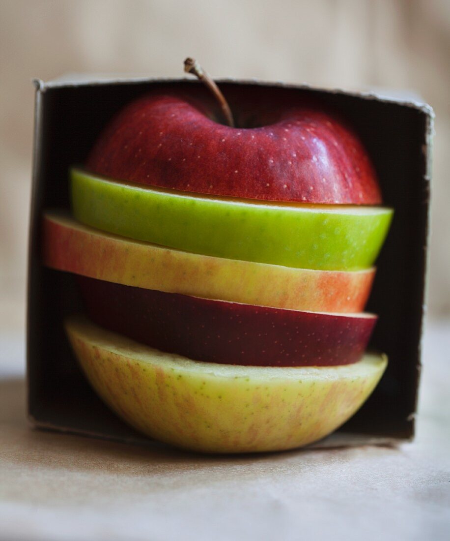 Various apple slices in a box