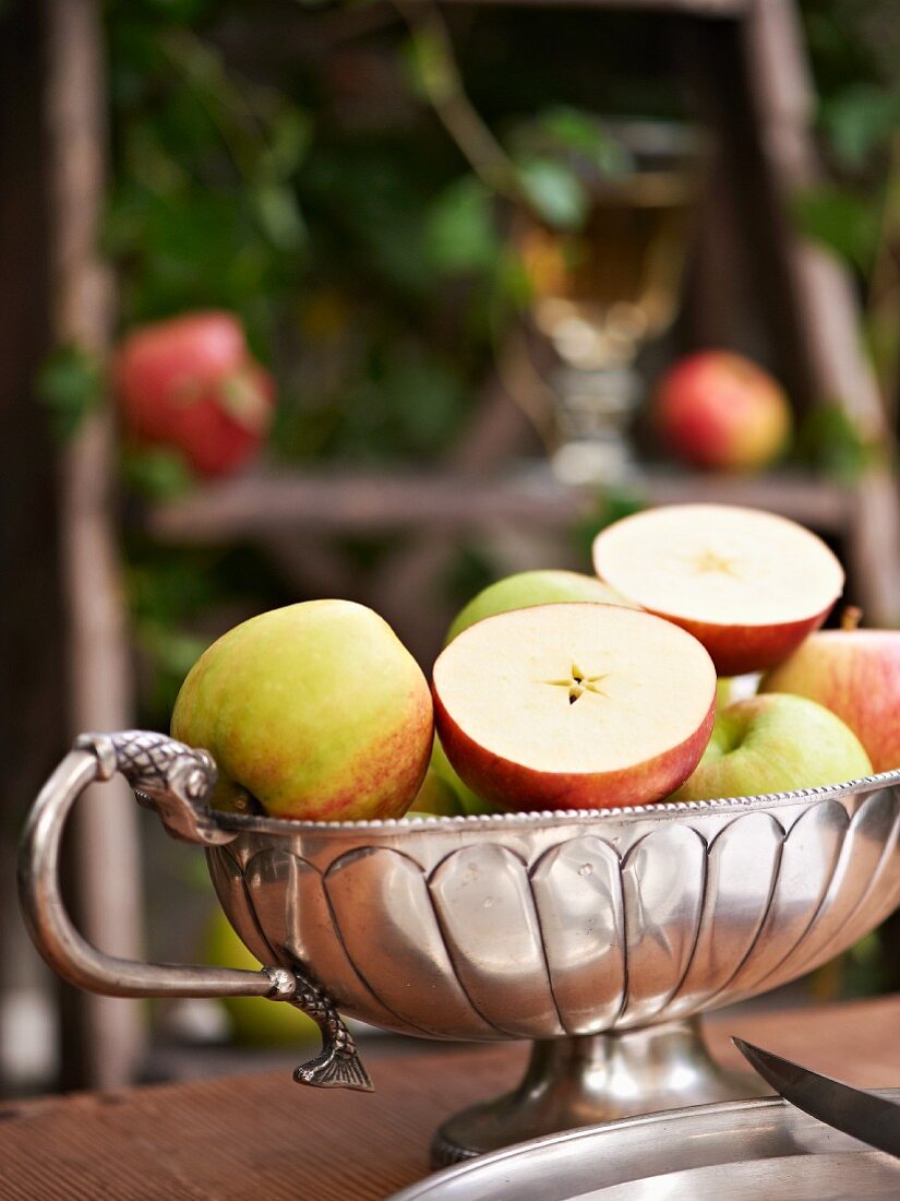 Fresh apples in a silver bowl