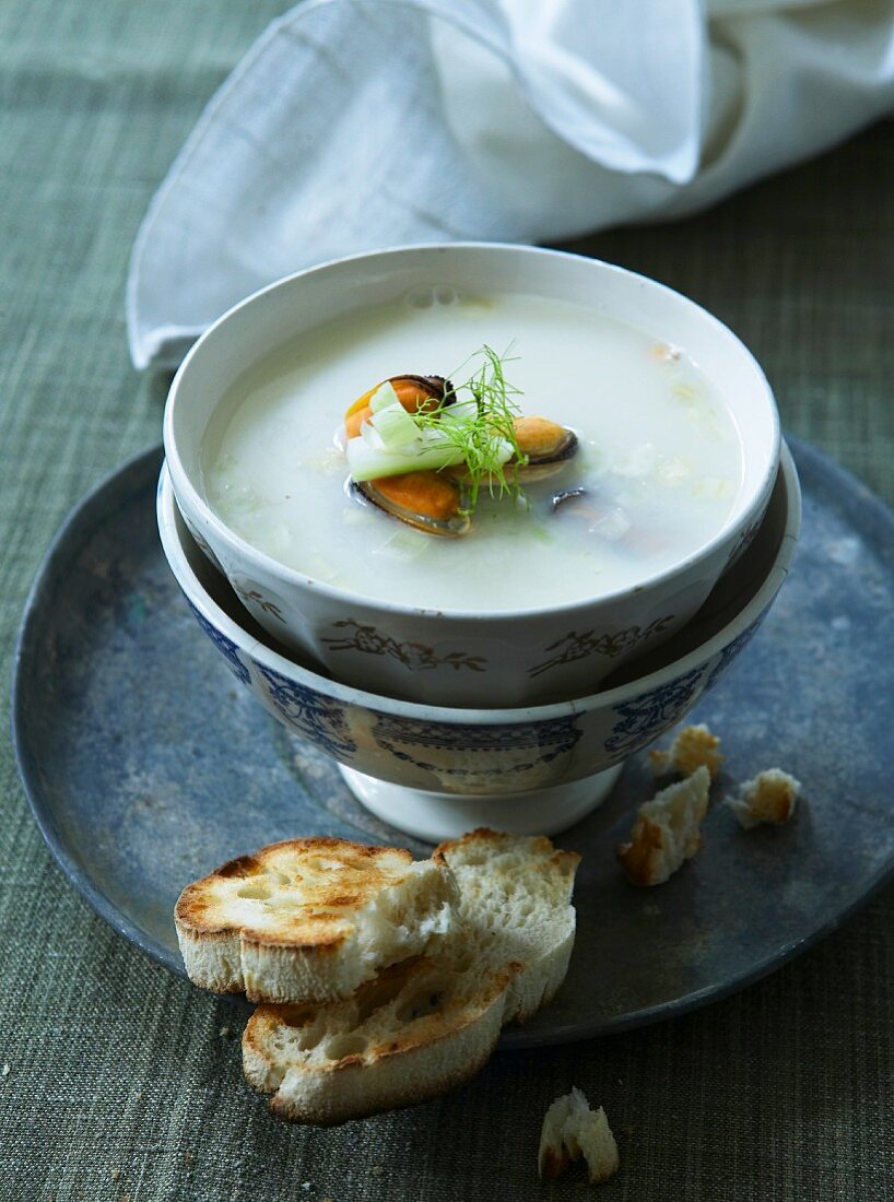 Mussel soup with grilled bread
