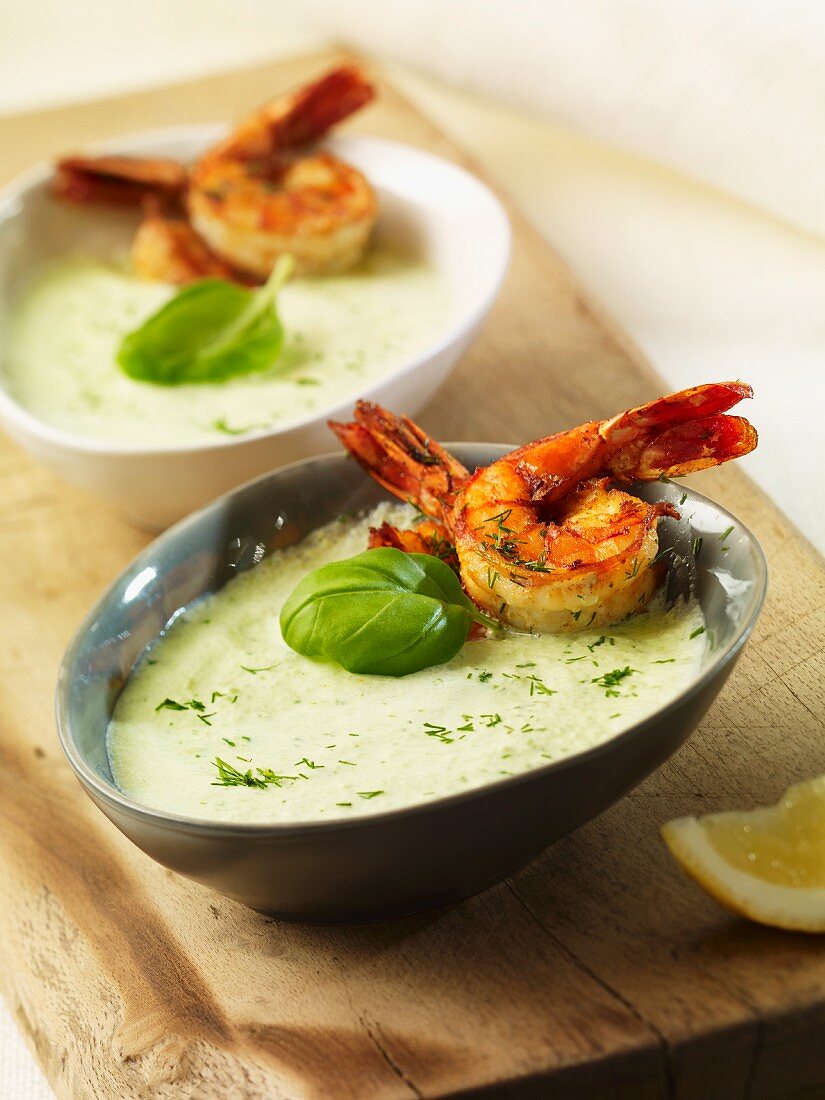Cold cucumber soup with herb prawns