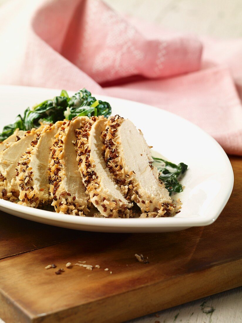 Steamed chicken breast with a sesame seed coating (Asia)