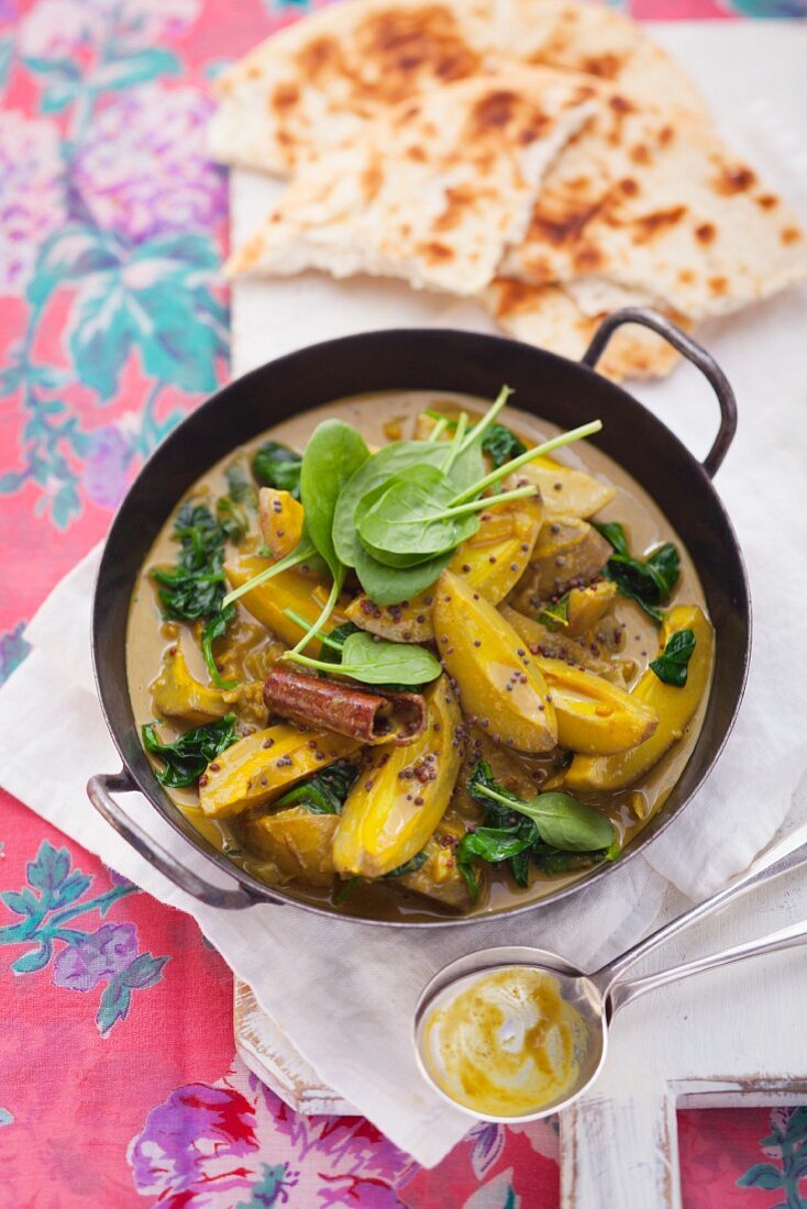 Green mango curry with naan bread