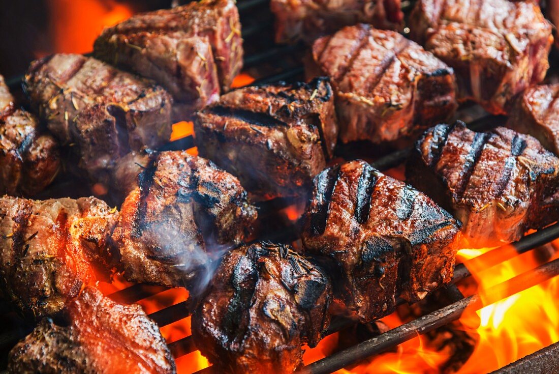 T-bone steaks on a barbecue
