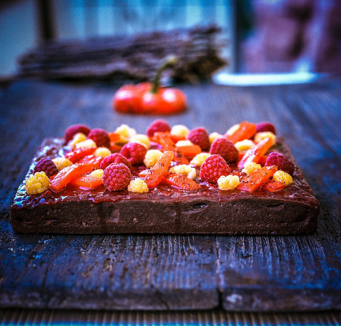 Chocolate tart with raspberry, pepper and chilli confit
