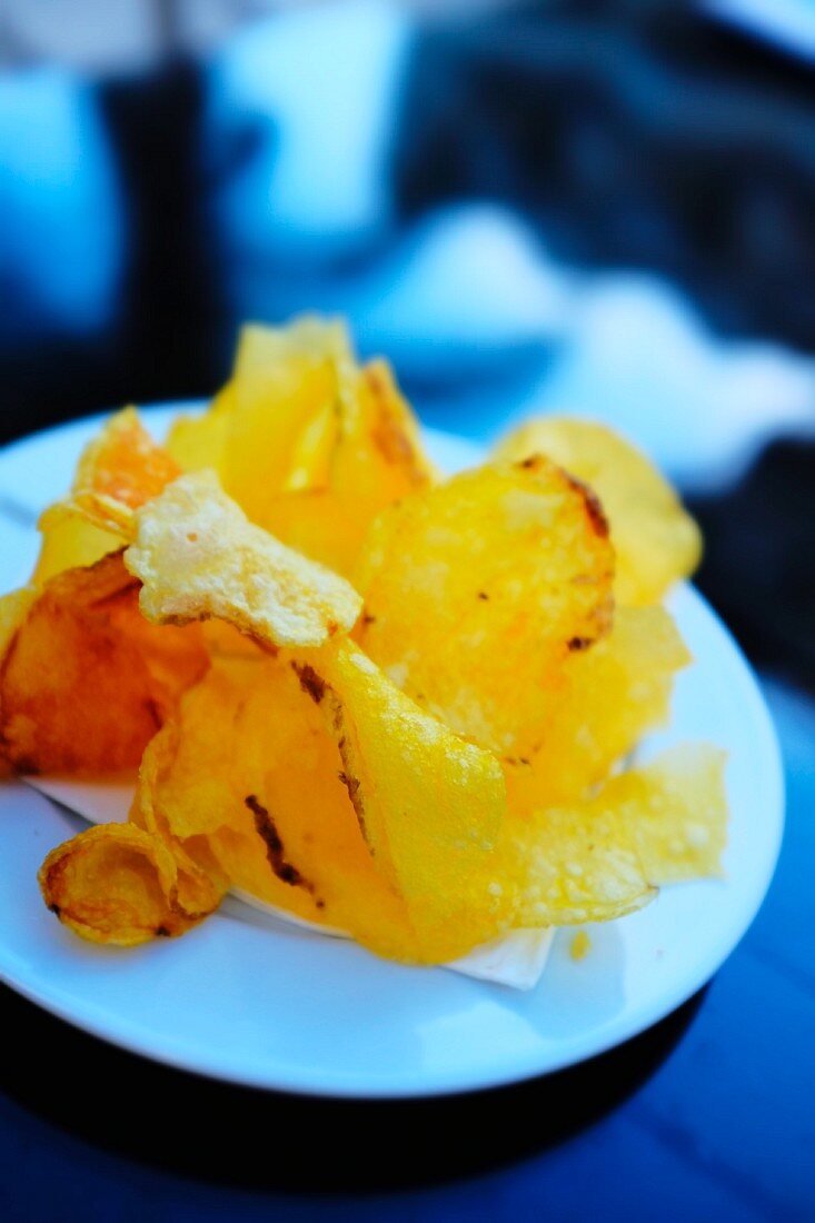 A plate of homemade potato crisps