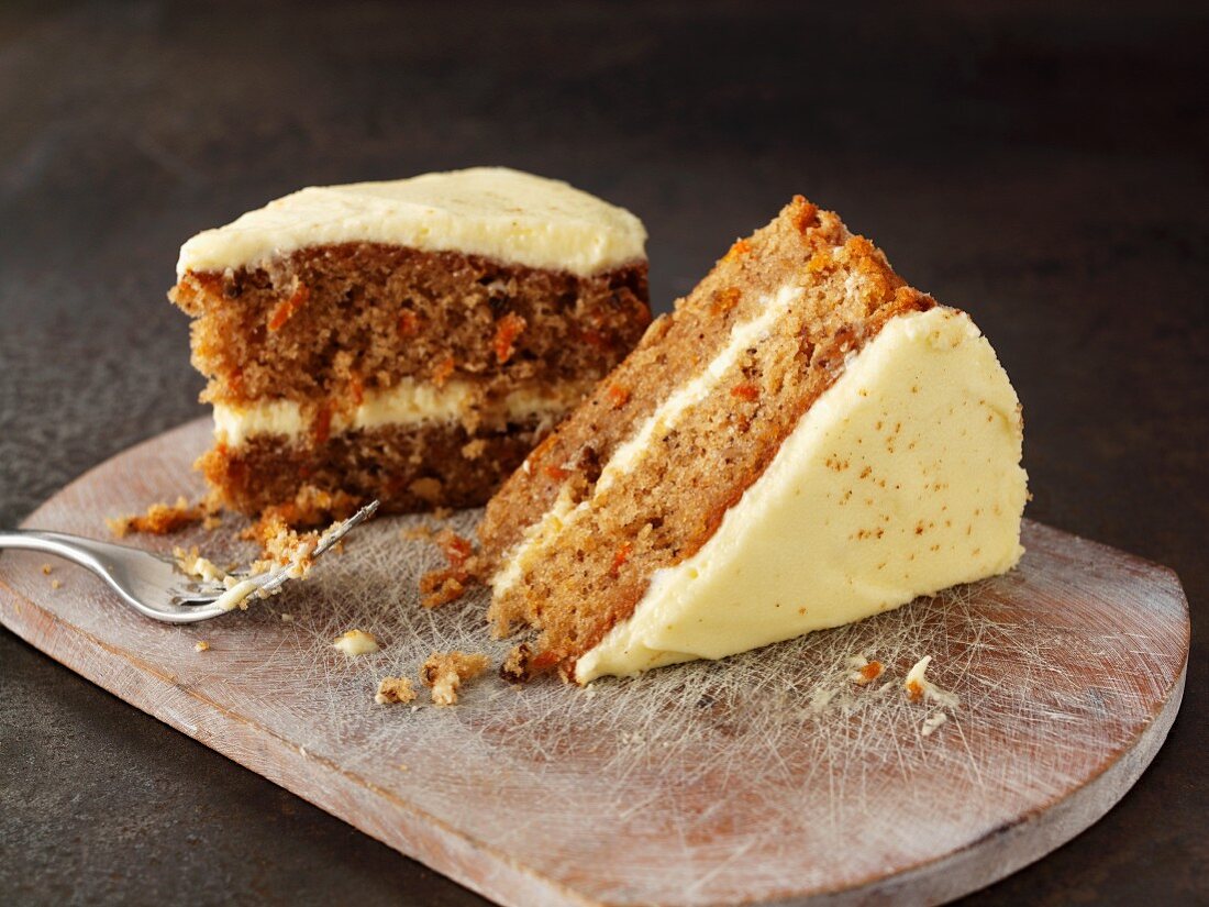 Two slices of carrot cake