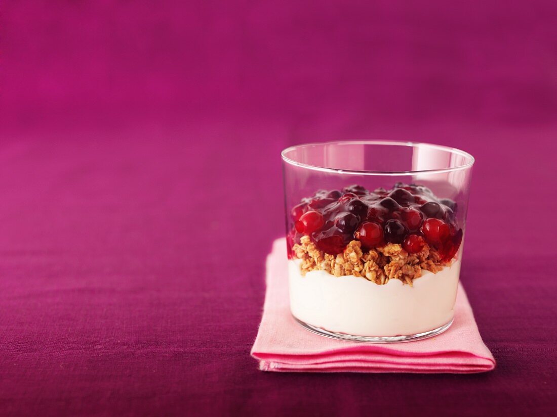 Berry compote with cereals and cream