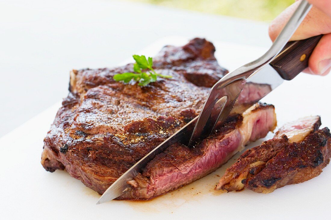 Beefsteak being sliced