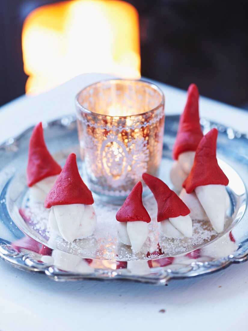 Festive arrangement of marzipan gnomes