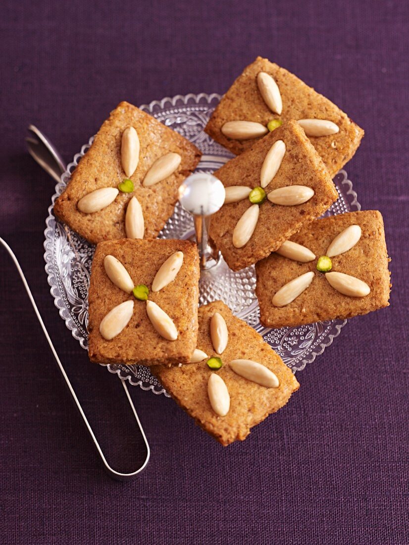 Almond biscuits on a glass plate