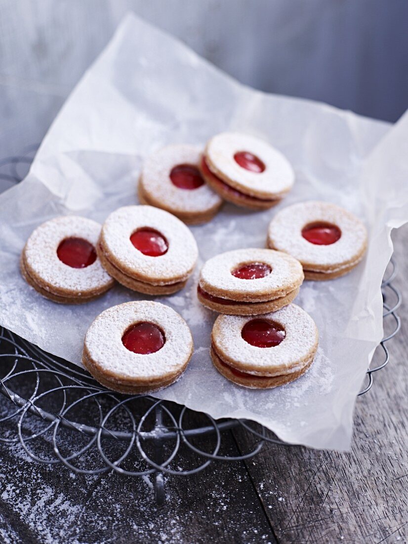 Jammy shortbread biscuits on a piece of paper