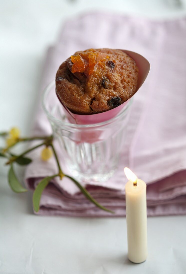 A sponge cake with rum-soaked raisins, candied oranges and kumquats in a bag