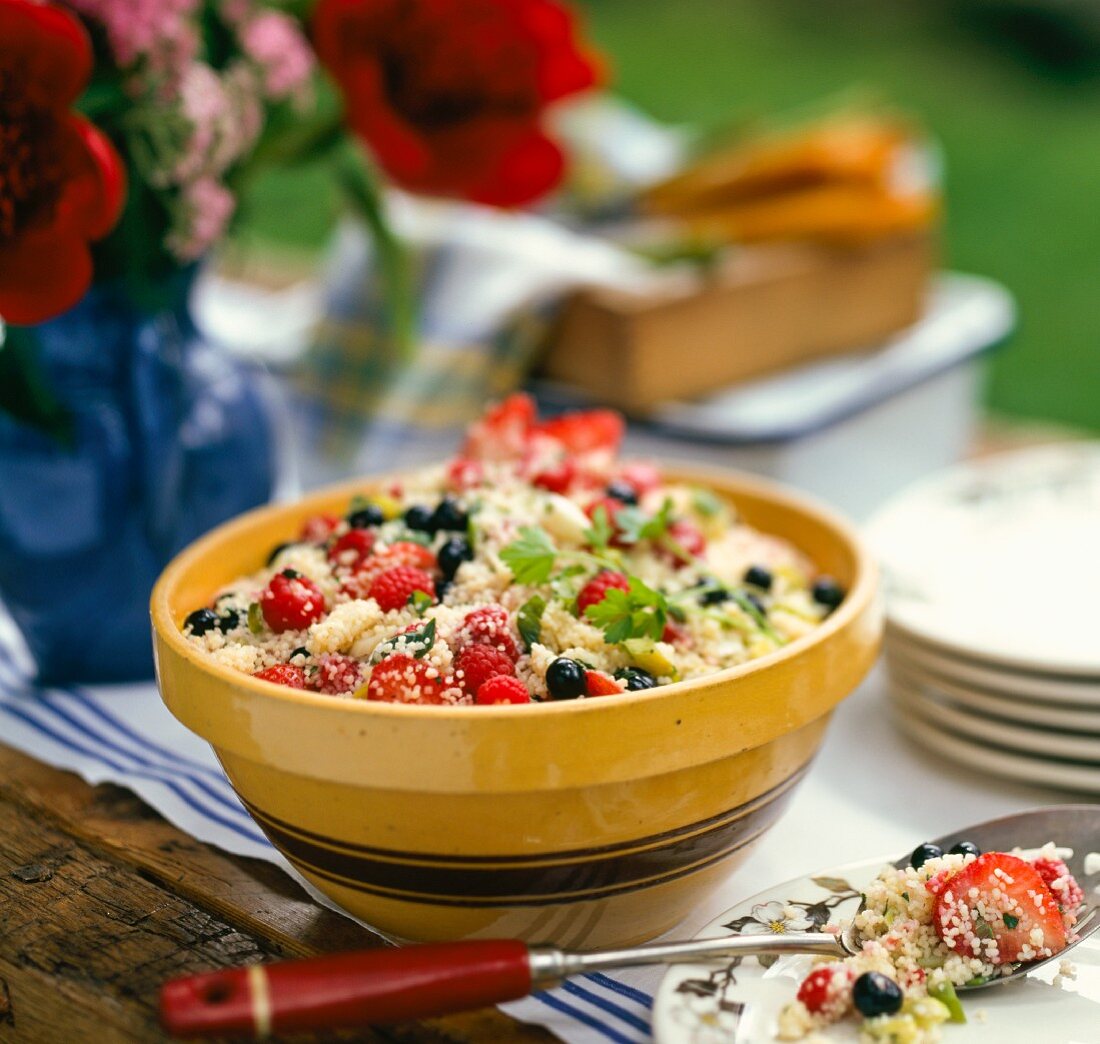 Couscous salad with berries for a barbecue party