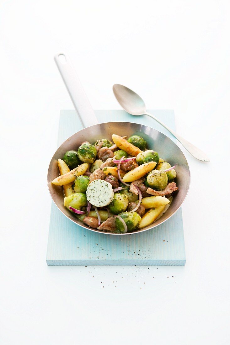 Potato orzo pasta with pork, Brussels sprouts, chestnuts and herb butter