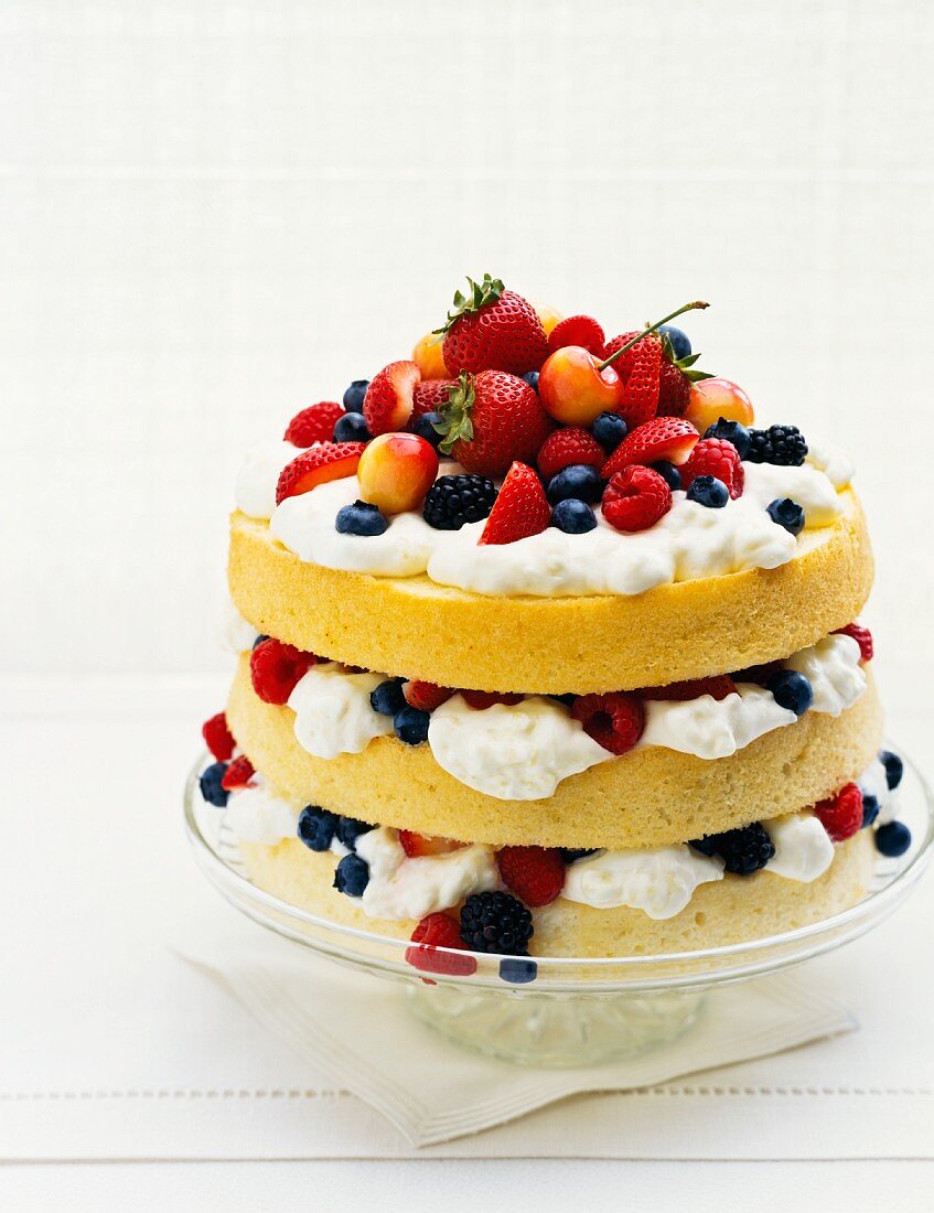A three layer berry cake